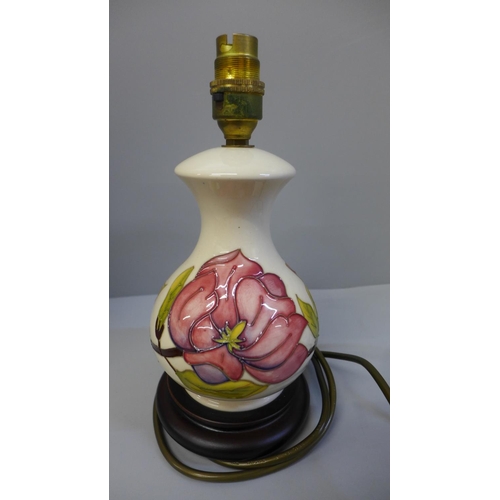 612 - A Moorcroft Magnolia lamp base, signed