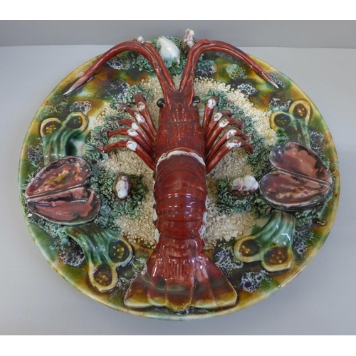 614 - A Majolica lobster plate, 33cm, impressed 1164 impressed mark to base