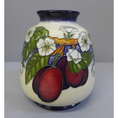 619 - A Moorcroft vase, designed by D. Hancock, 1999, 14.5cm