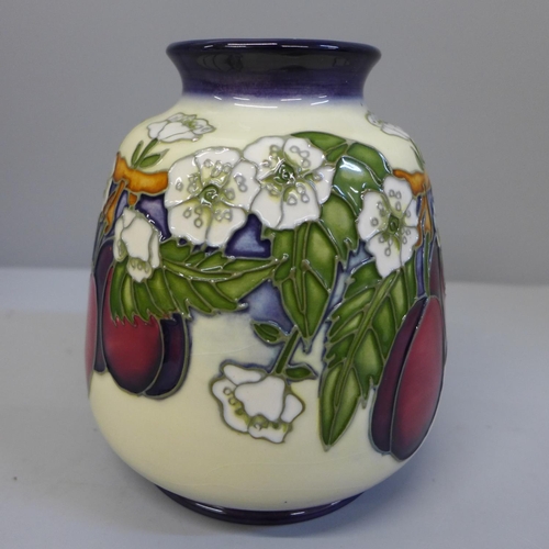 619 - A Moorcroft vase, designed by D. Hancock, 1999, 14.5cm