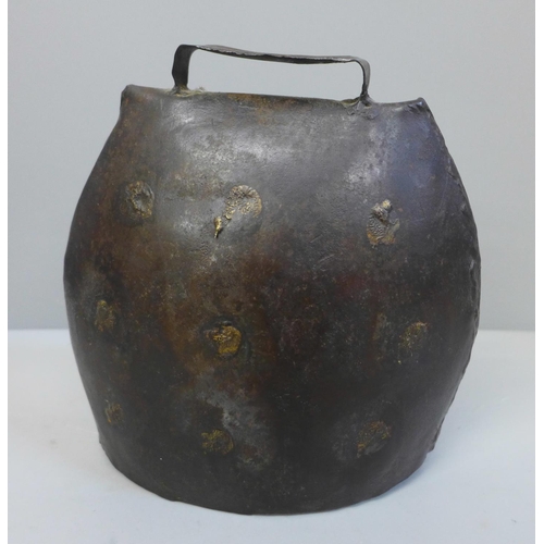 622 - A brass cow bell, 17cm