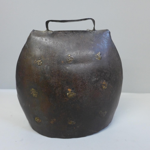 622 - A brass cow bell, 17cm