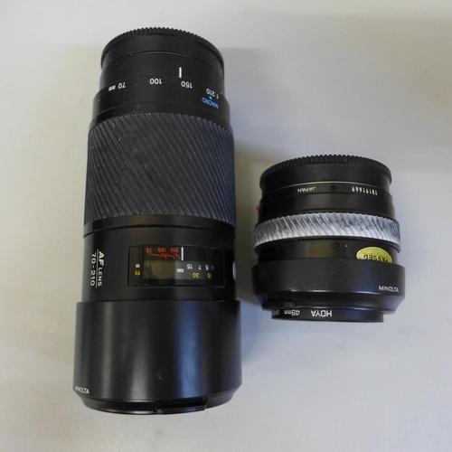 629 - Two Minolta camera lenses, 70-210mm AF lens and 35-70mm, cased