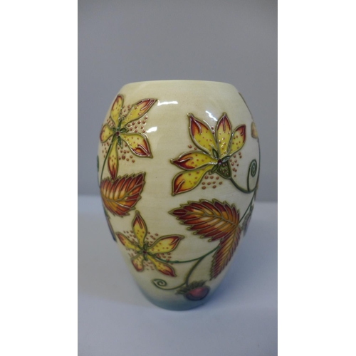 636 - A Moorcroft vase, 13cm, boxed