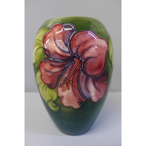 637 - A Moorcroft hibiscus vase, 7