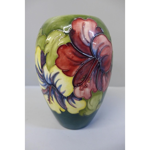 637 - A Moorcroft hibiscus vase, 7