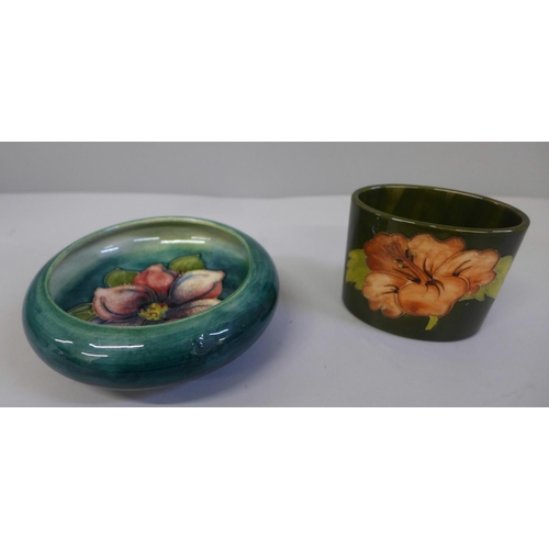 638 - A Moorcroft small green dish, crazed and hibiscus posy holder