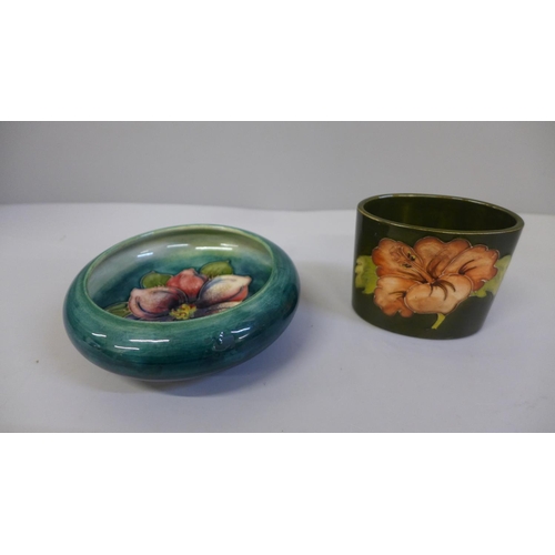 638 - A Moorcroft small green dish, crazed and hibiscus posy holder