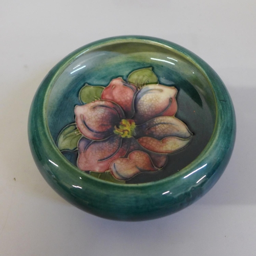 638 - A Moorcroft small green dish, crazed and hibiscus posy holder