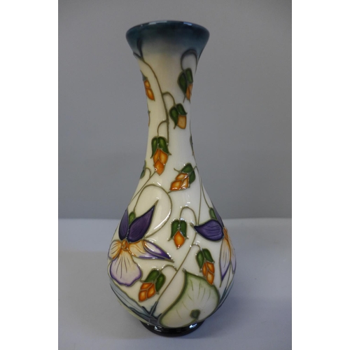 642 - A Moorcroft Sweet Thief vase, 17cm