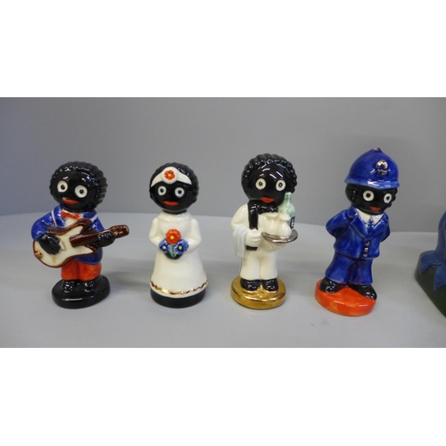 650 - A set of Carlton ware:- limited edition The Piano Player with four small figures