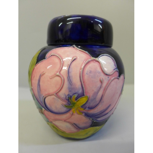 654 - A Moorcroft Magnolia ginger jar, 11cm, boxed