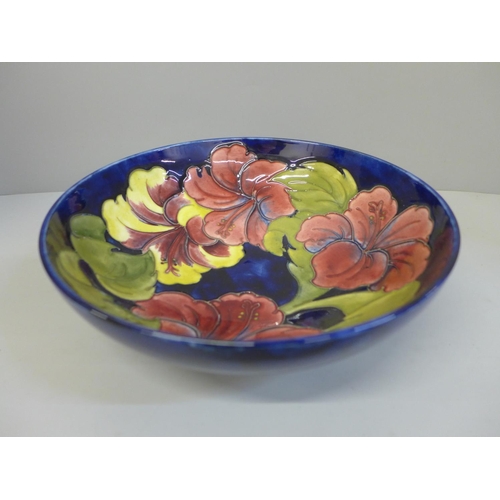 667 - A large Moorcroft hibiscus bowl, 26cm