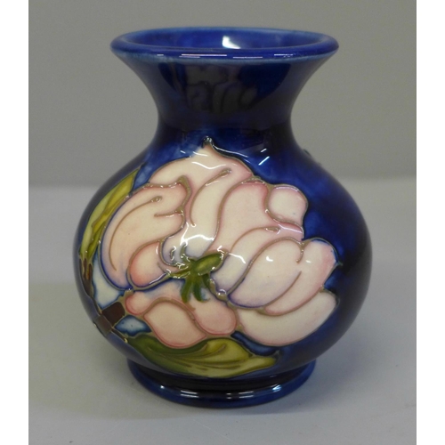 671 - A small Moorcroft vase, 9.5cm