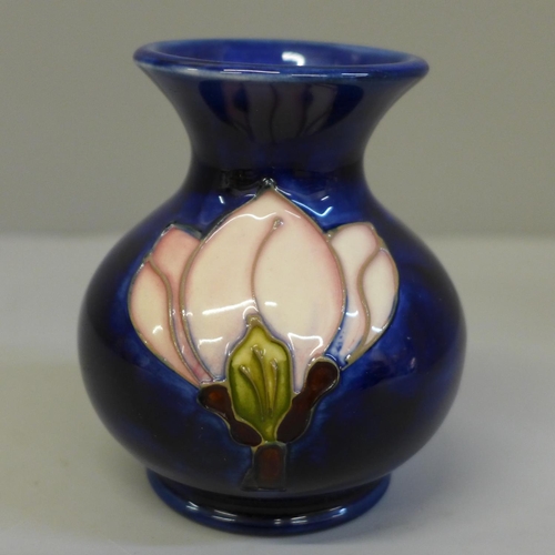 671 - A small Moorcroft vase, 9.5cm