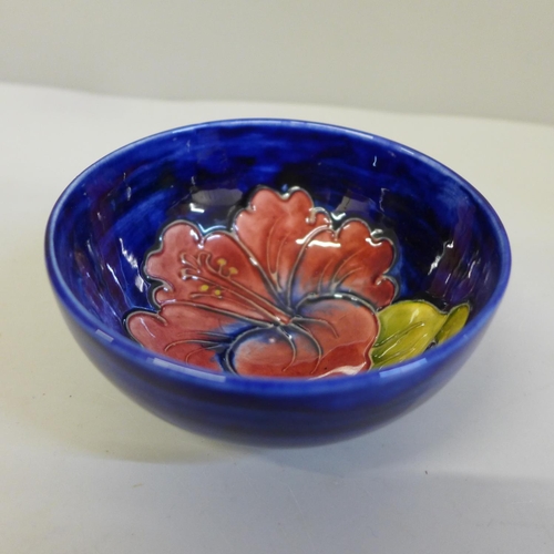 673 - A small Moorcroft hibiscus bowl, 10.5cm