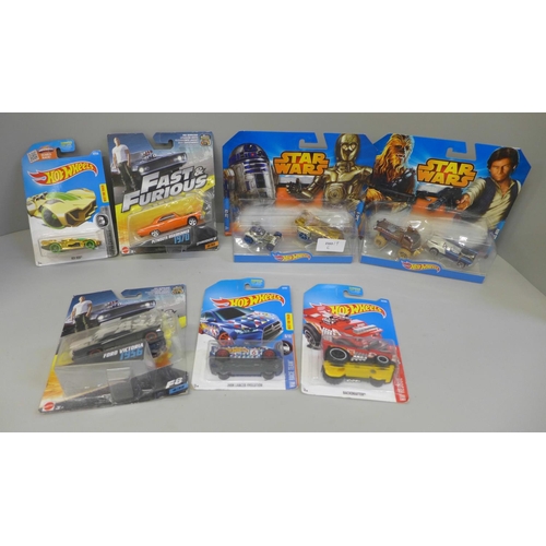 690 - Five Hot Wheels model vehicles and two Mattel Fast and Furious and Star Wars, all packaged