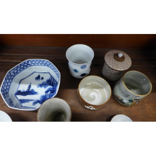 713 - Eleven items of Chinese and Japanese pottery and porcelain including a glazed hand painted pot, sign... 