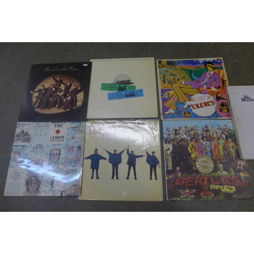 716 - A collection of seven The Beatles and related LP records including a Beatles box set, Wings, John Le... 