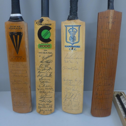 725 - Five souvenir miniature cricket bats, signed by international teams and country teams; MCC Hong Kong... 