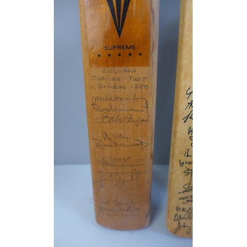 725 - Five souvenir miniature cricket bats, signed by international teams and country teams; MCC Hong Kong... 