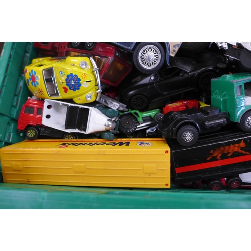 801 - A box of die-cast model vehicles and figures