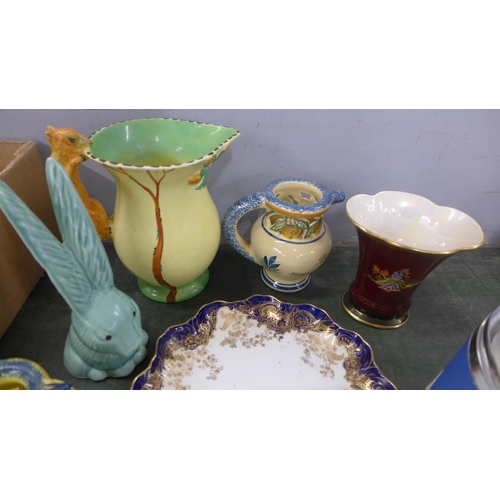 804 - Assorted china; a Sylvac long eared rabbit, a USSR model of a tiger cub, two Quimper jugs, a Crown D... 