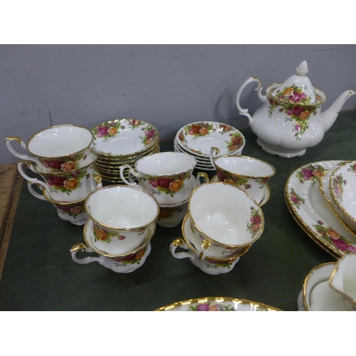 806 - A large collection of Royal Albert Old Country Roses including a teapot, a cream jug (small chip to ... 