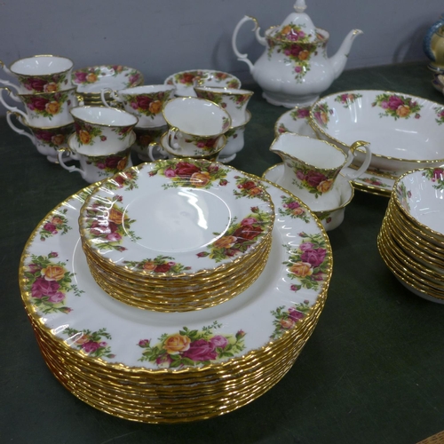 806 - A large collection of Royal Albert Old Country Roses including a teapot, a cream jug (small chip to ... 