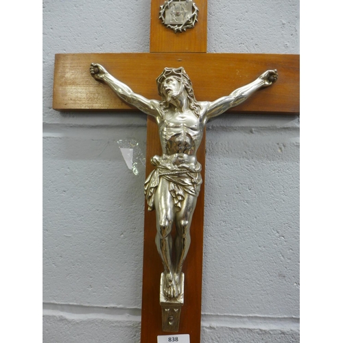 838 - A wooden and metal crucifix