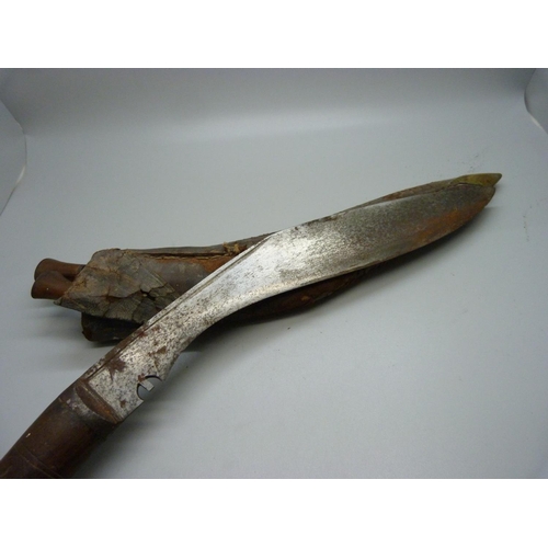 871 - A carved wooden and metal Gurkha knife from India