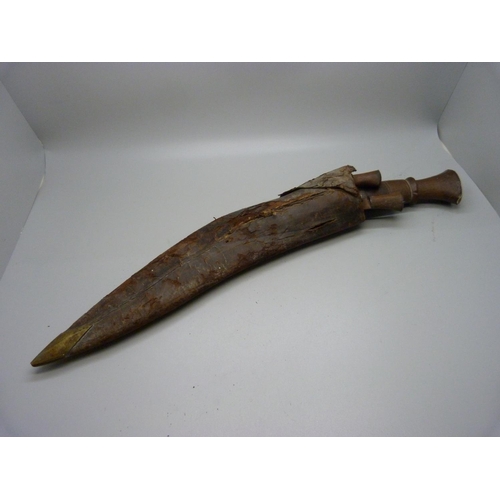 871 - A carved wooden and metal Gurkha knife from India