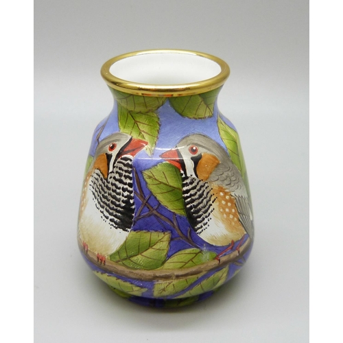 878 - A Moorcroft miniature enamel vase, 53/100