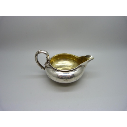 894 - A Garrard silver jug, gilt interior, London 1829, 176g