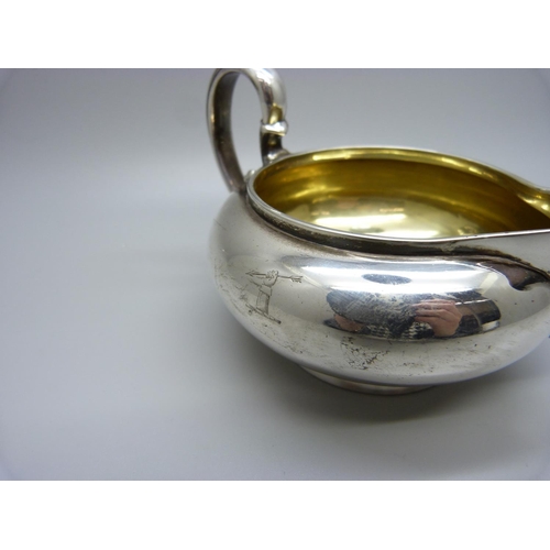 894 - A Garrard silver jug, gilt interior, London 1829, 176g