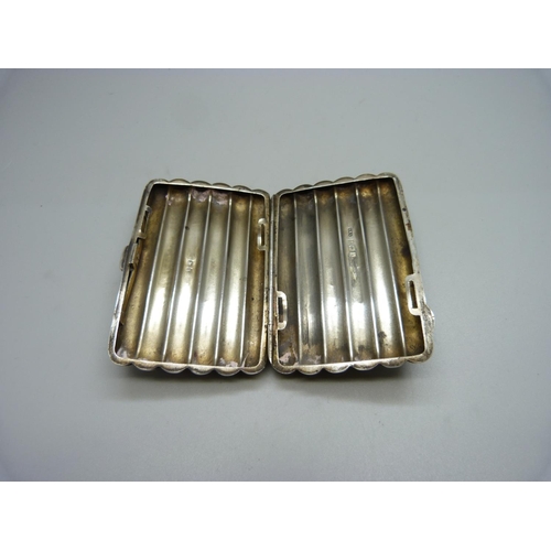 917 - A silver cigarette case, Birmingham 1909, 60g