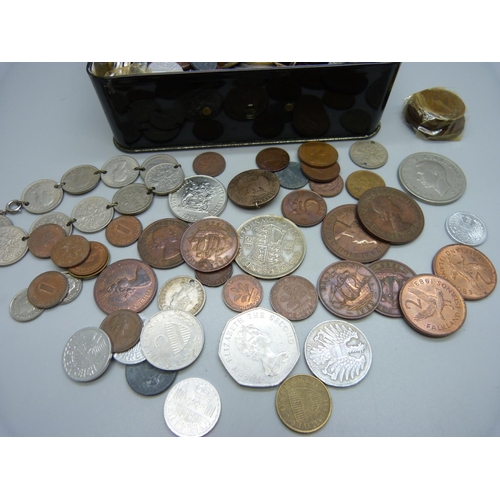 925 - A collection of British and foreign coins including a 1942 half crown