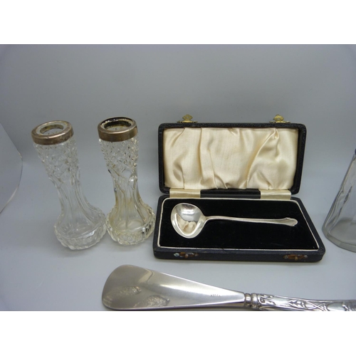 928 - A silver pin tray, christening spoon, shoe horn, etc.