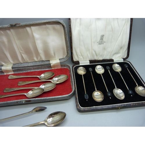 932 - A set of six silver coffee bean spoons, a pair of small silver and mother of pearl forks, etc.