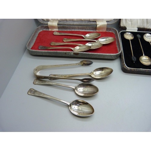 932 - A set of six silver coffee bean spoons, a pair of small silver and mother of pearl forks, etc.