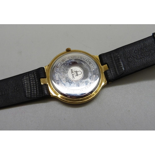 937 - An Aggostino wristwatch with date, boxed