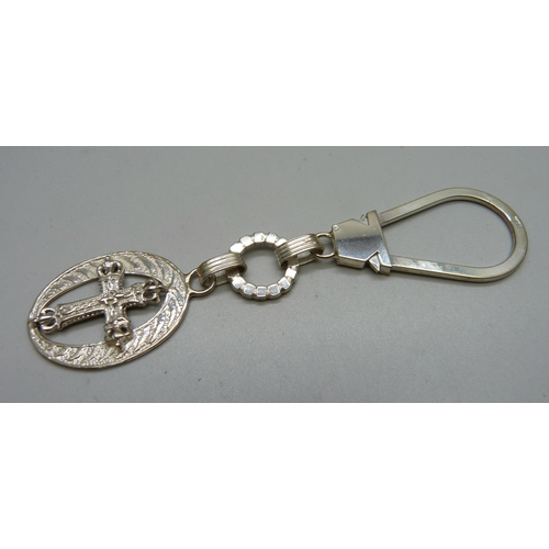 938 - A silver cross keyring