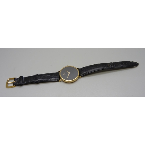 965 - An 18ct gold Vacheron & Constantin Geneve dress wristwatch, the 33mm case marked 520950, on a black ... 