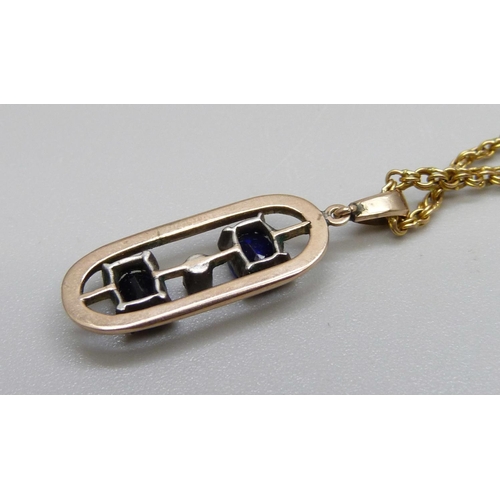 966 - A yellow metal, sapphire and diamond pendant on a 9ct gold chain, total weight 5.6g, chain 43cm