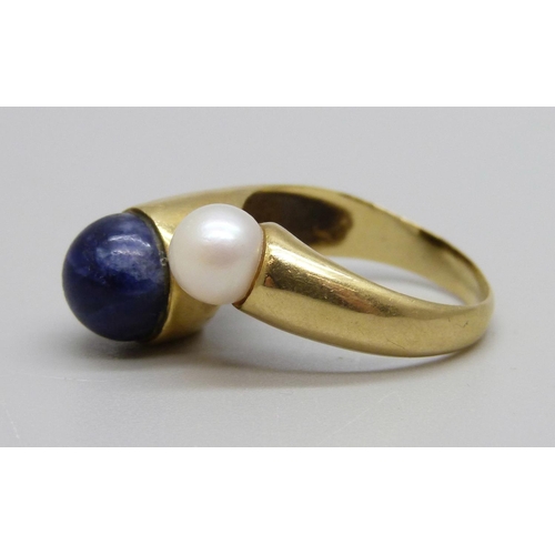 970 - A yellow metal, lapis lazuli and pearl ring, 5.7g, N, continental control mark on the outside of the... 