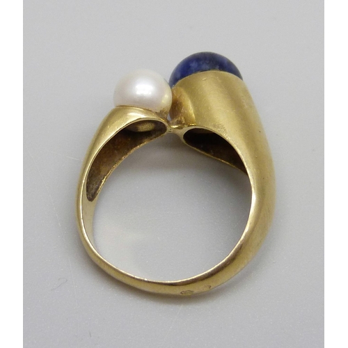 970 - A yellow metal, lapis lazuli and pearl ring, 5.7g, N, continental control mark on the outside of the... 