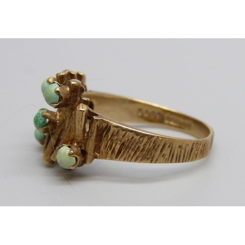 992 - A 9ct gold and turquoise ring, 4.8g, Q, lacking one turquoise