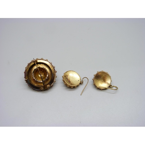 994 - A Victorian yellow metal brooch and a pair of similar earrings, 16.3g, (earrings test as high carat ... 