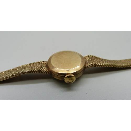 999 - A lady's 9ct gold Omega wristwatch, 14.8g total weight