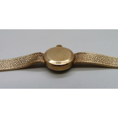 999 - A lady's 9ct gold Omega wristwatch, 14.8g total weight